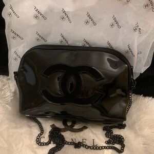 Chanel precision crossbody or use as clutch.  NWOT.Comes w/ Chanel paper and bag